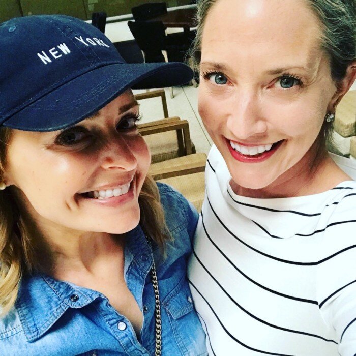 Photo of story contributor and her friend smiling.