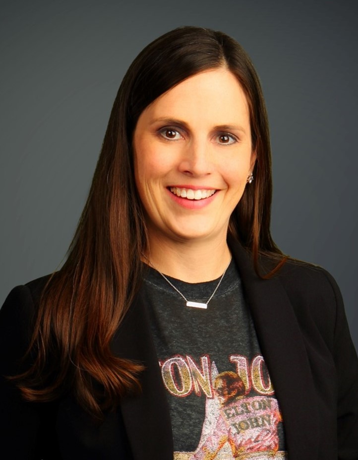 Portrait of Jackie Stebbins, story contributor, wearing an Elton John graphic tee.