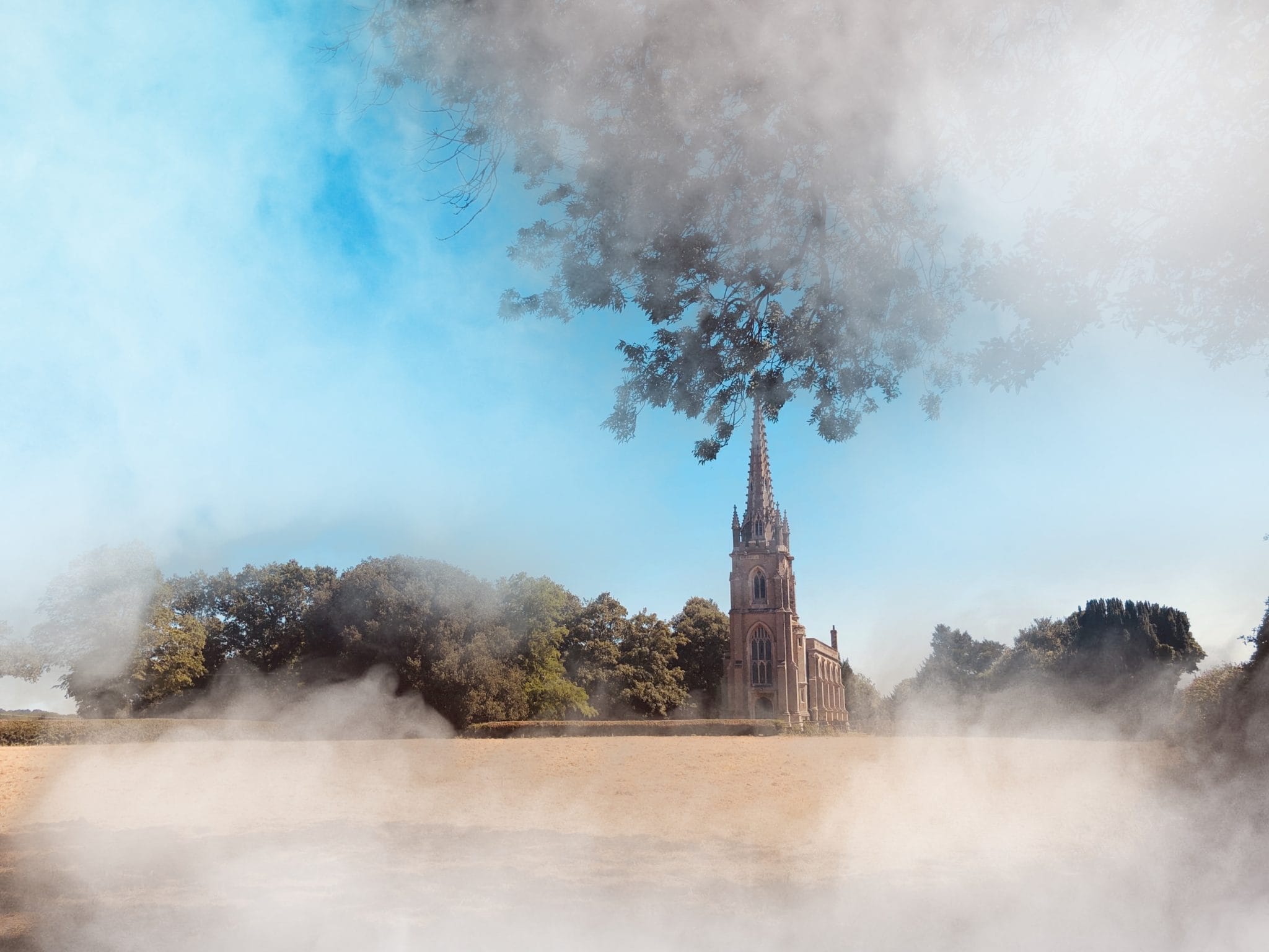 Hazy, sunny skies over a town.