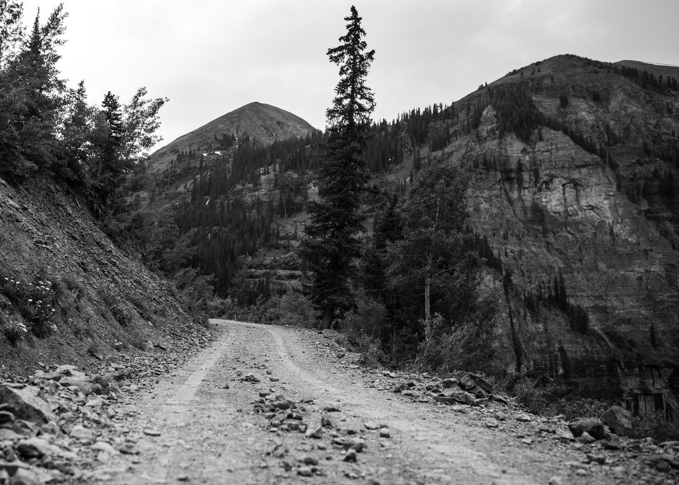 Black and white rocky mountain road.